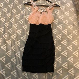 Tight pink and black homecoming dress